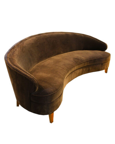 Outstanding contemporary curved velvet sofa inspired by Vladimir Kagan. Sculptural modern seating with fluid form and luxurious velvet upholstery.