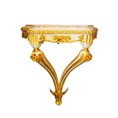19th century French cream-painted and parcel-gilt wall-mounted console with faux marble top, egg-and-dart frieze, lion mask mounts, and sweeping V-form cabriole supports with floral rosettes