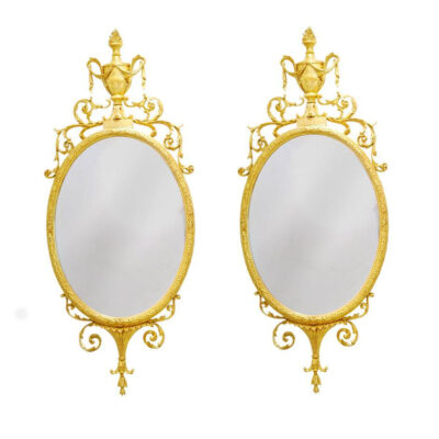 pair of oval gilt-frame George III Mirrors