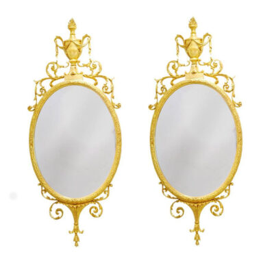 pair of oval gilt-frame George III Mirrors
