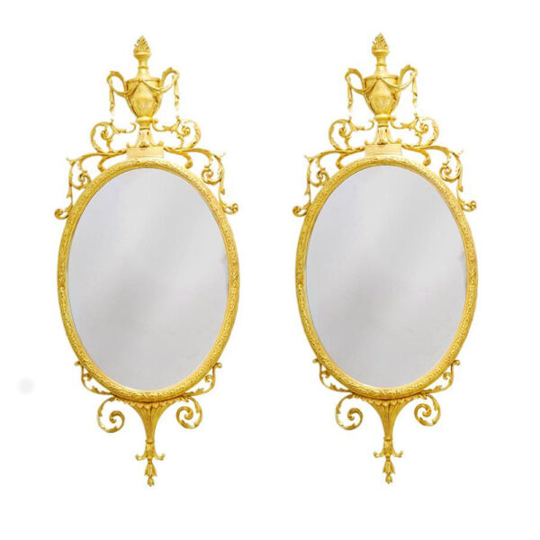 pair of oval gilt-frame George III Mirrors