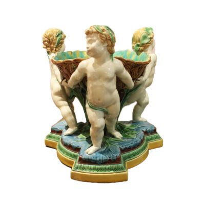 Minton factory majolica bowl with 3 Putti