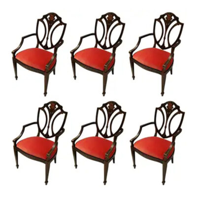 Studio shot of a set of 6 modern english sheild back chairs with floral motiff