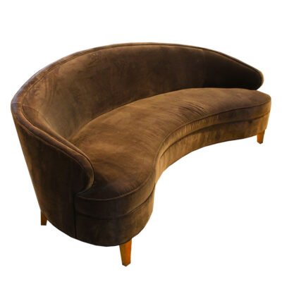 Outstanding contemporary curved velvet sofa inspired by Vladimir Kagan. Sculptural modern seating with fluid form and luxurious velvet upholstery.