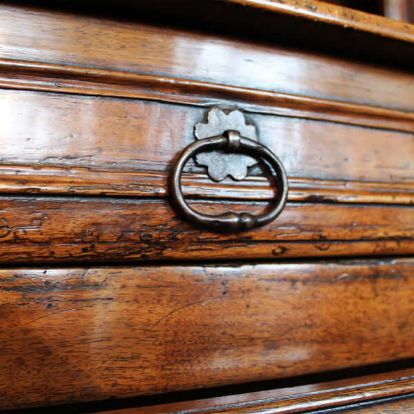 close up of drawer pulls on antique buffet