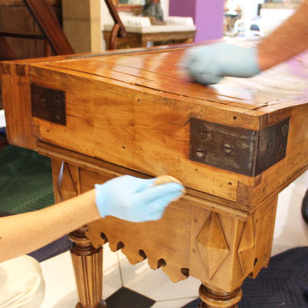 french polish being applied by hand