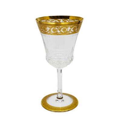 Set of six Saint Louis Thistle Gold American water glasses. Mouth-blown, hand-cut crystal with elegant gilded accents, presented in perfect condition.