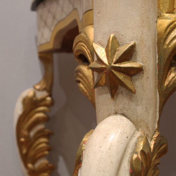 Close up shot of cabriolet leg on Rose Cumming's console table